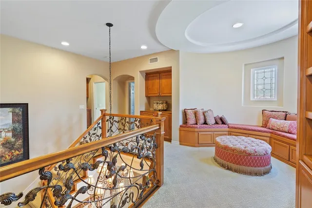 a view of a backyard with sitting area