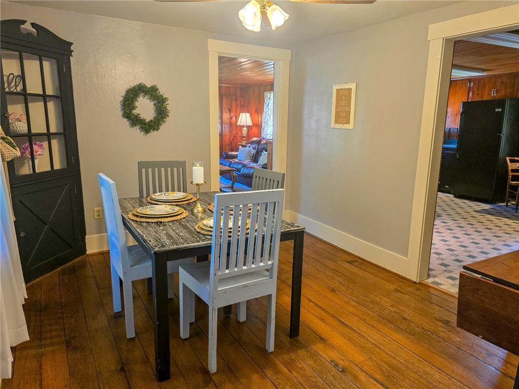 1638 Lake Road Mercer, PA 16137 - Photo 5 of 50 a view of a dining room with furniture and wooden floor