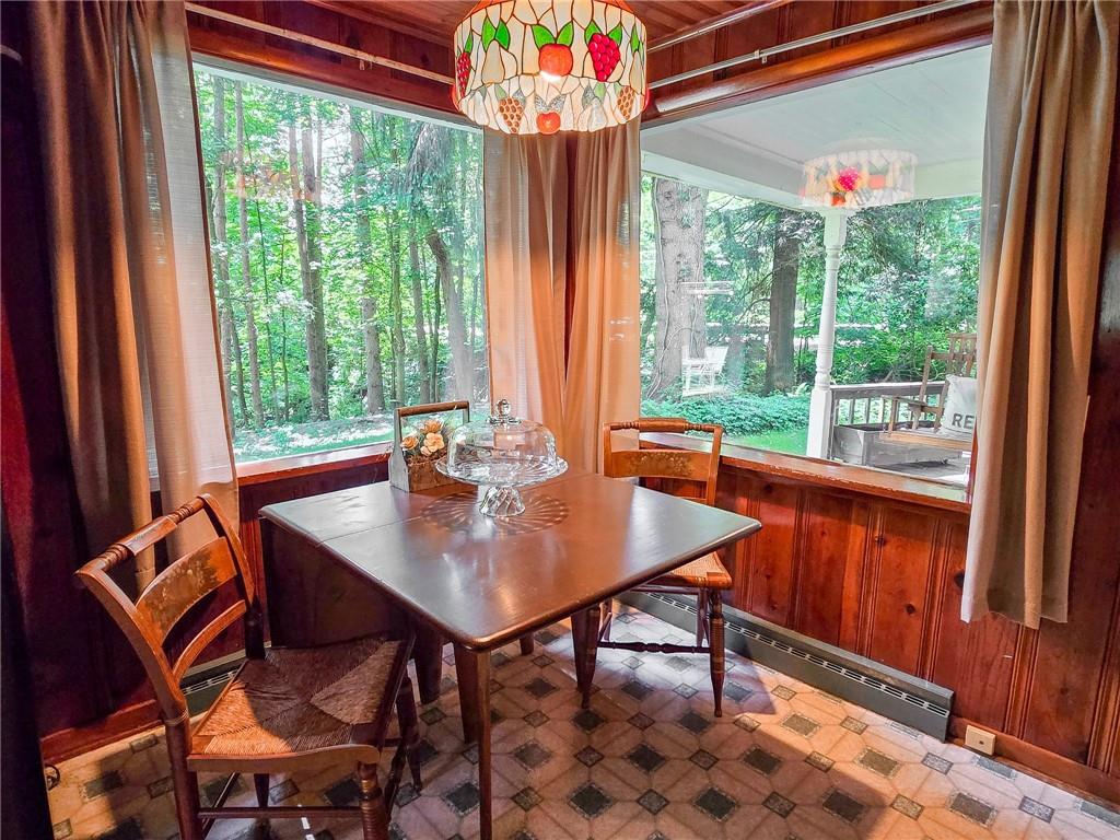 1638 Lake Road Mercer, PA 16137 - Photo 8 of 50 a dining room with furniture and window