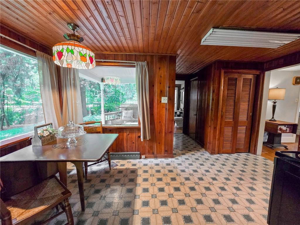 1638 Lake Road Mercer, PA 16137 - Photo 9 of 50 a dining room with furniture and window