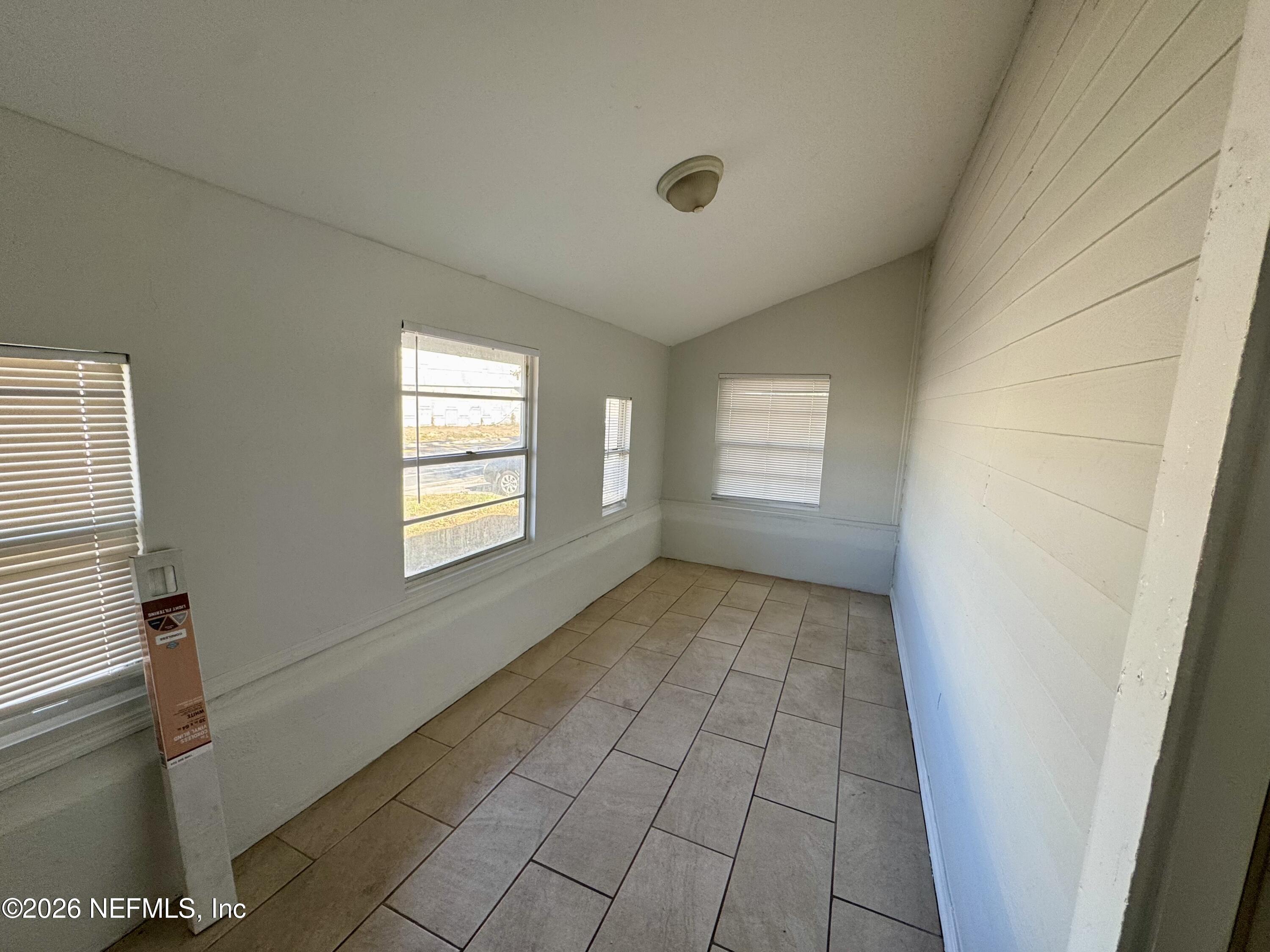 3032 Rayford Street Jacksonville, FL 32205 - Photo 2 of 17 a view of an empty room and window