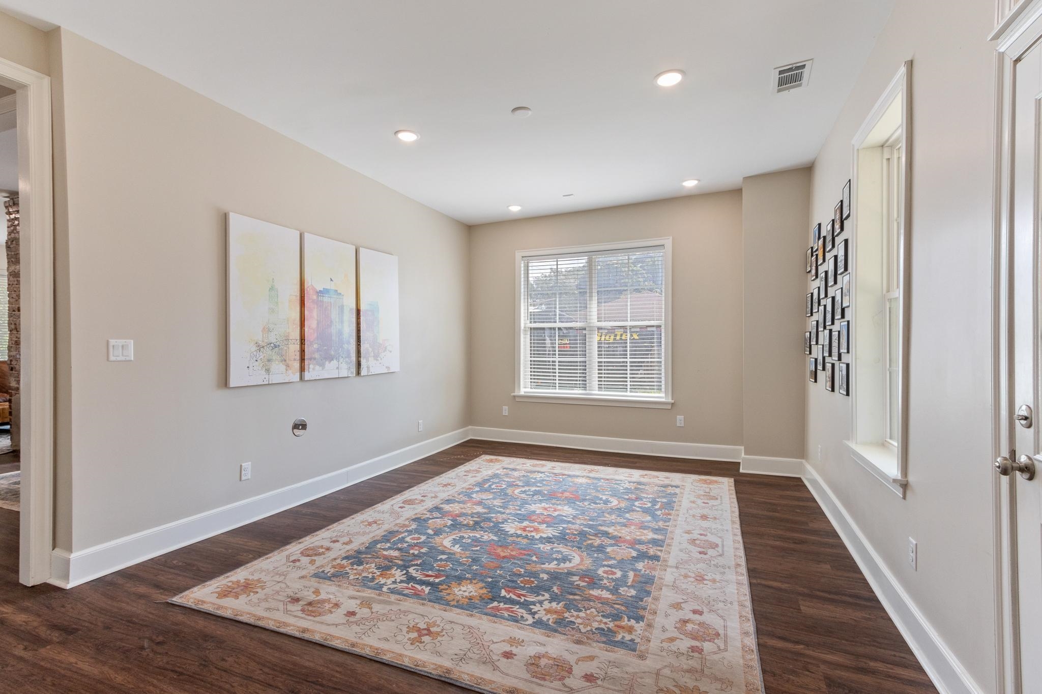 4775 Macon Road Memphis, TN 38122 - Photo 13 of 31 a view of empty room with wooden floor and window