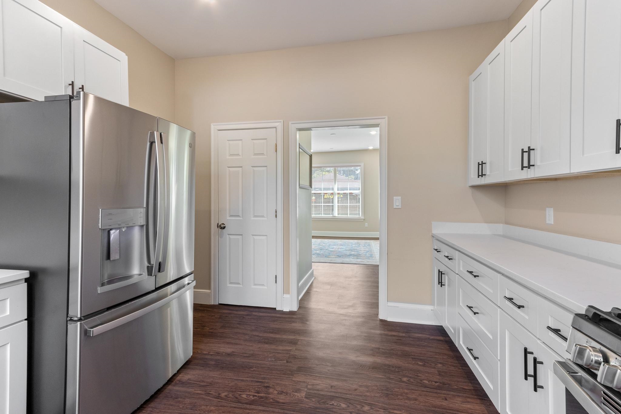 4775 Macon Road Memphis, TN 38122 - Photo 17 of 31 a kitchen with stainless steel appliances granite countertop a refrigerator and a stove