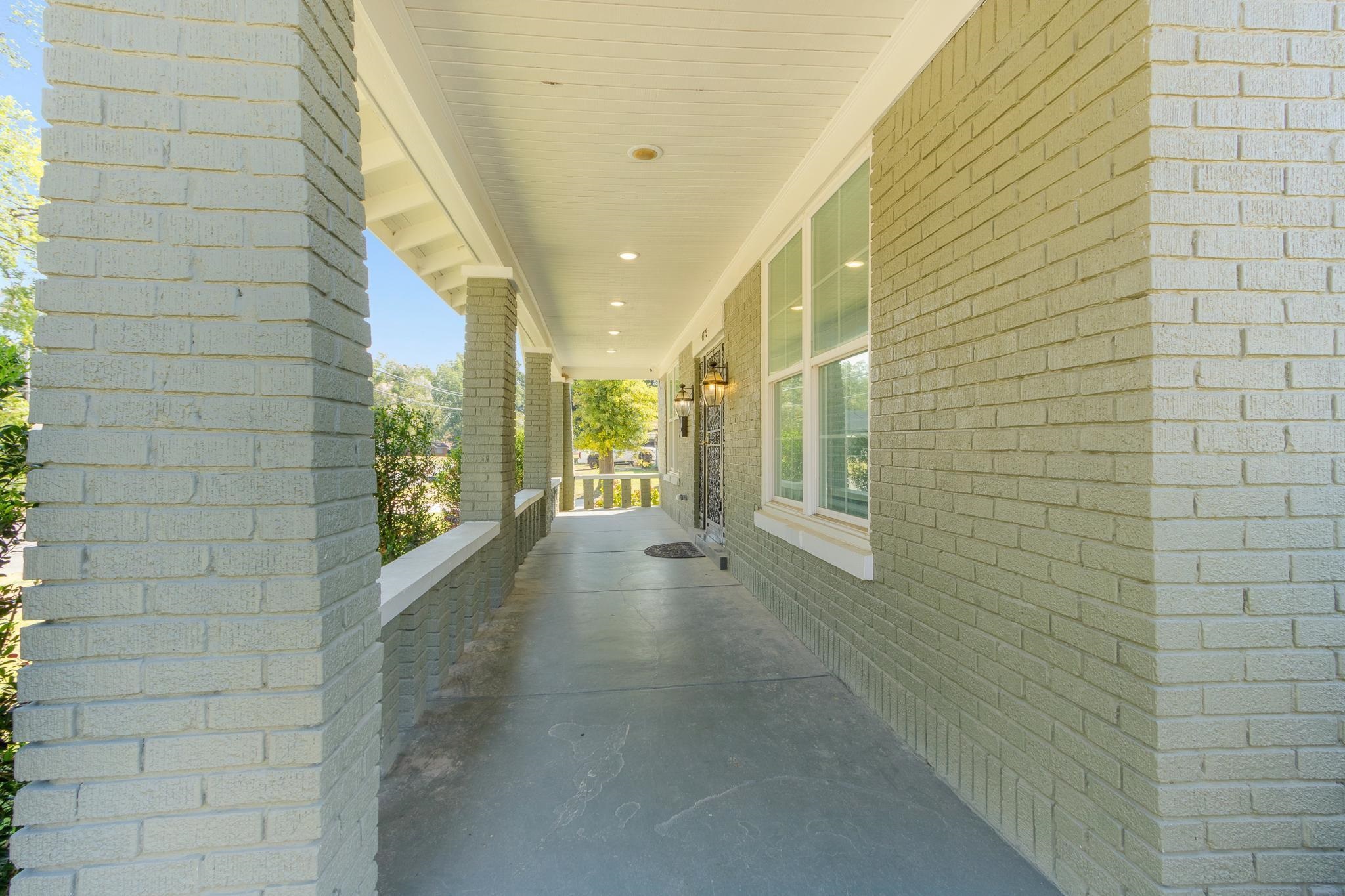4775 Macon Road Memphis, TN 38122 - Photo 4 of 31 a view of a pathway along with brick wall