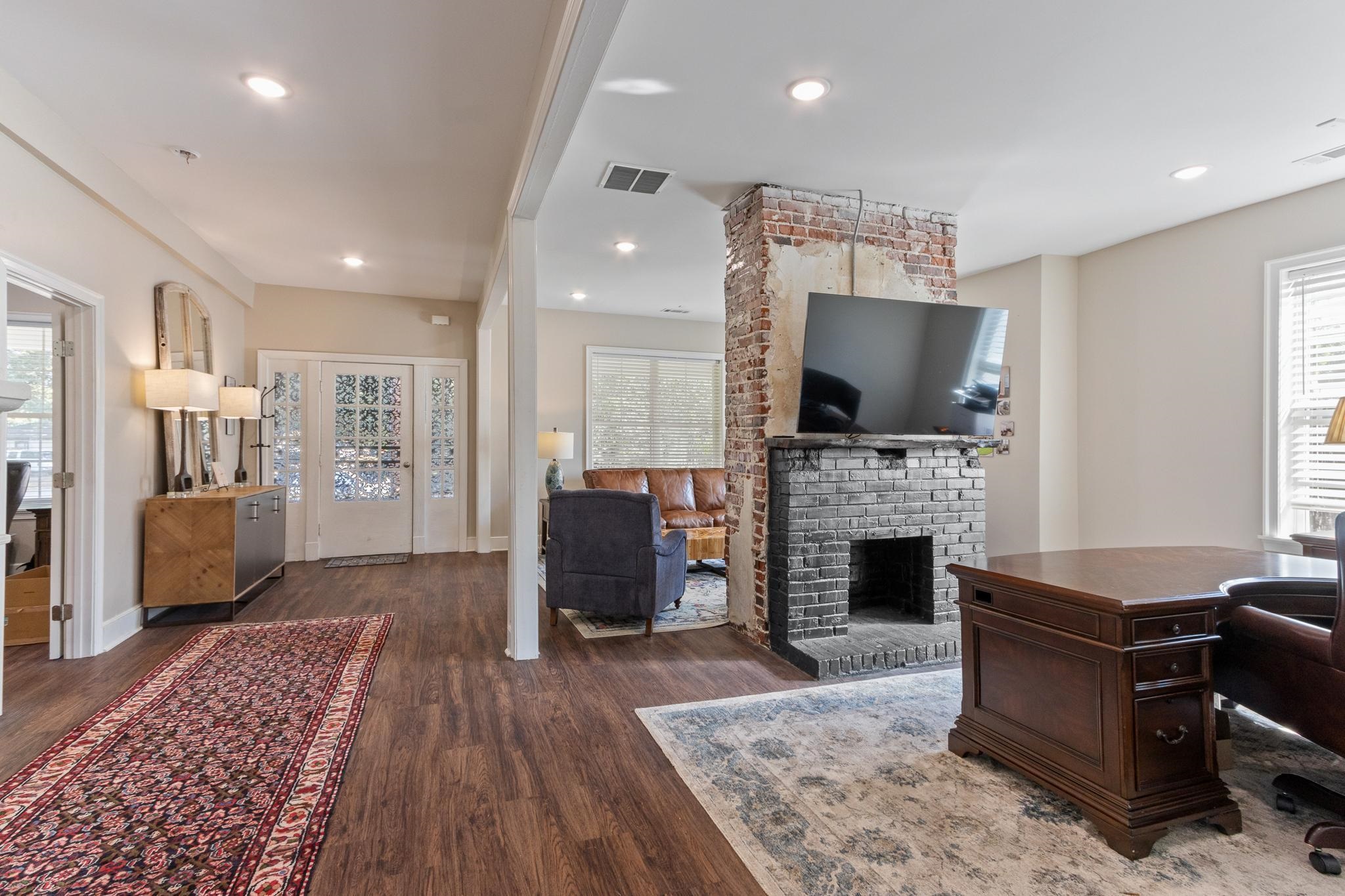 4775 Macon Road Memphis, TN 38122 - Photo 8 of 31 a living room with furniture and a fireplace