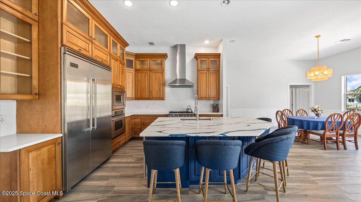 121 Boca Ciega Road Cocoa Beach, FL 32931 - Photo 13 of 50 a view of a dining room with furniture