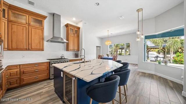 a kitchen that has a cabinets counter space and a stove