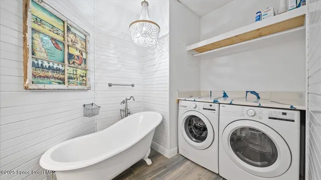 a bathroom with a toilet a sink and a bathtub