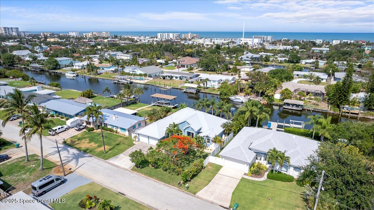 121 Boca Ciega Road Cocoa Beach, FL 32931 - Photo 44 of 50 an aerial view of a city