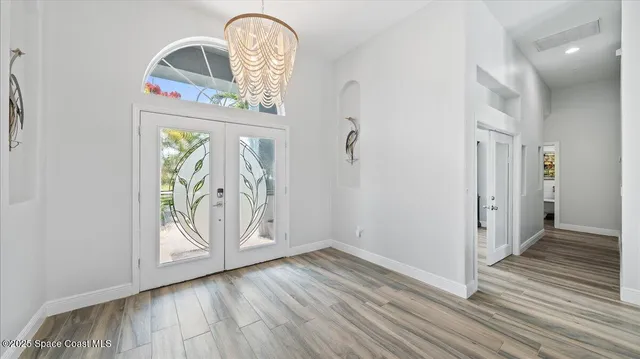 a view of a livingroom with wooden floor