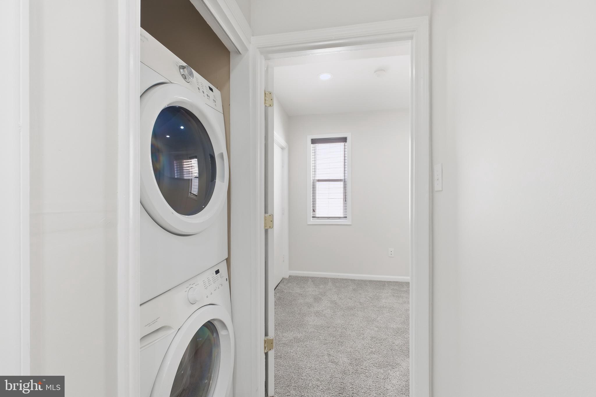 2712 6th Street Northeast Washington, DC 20017 - Photo 21 of 24 a utility room with dryer and washer