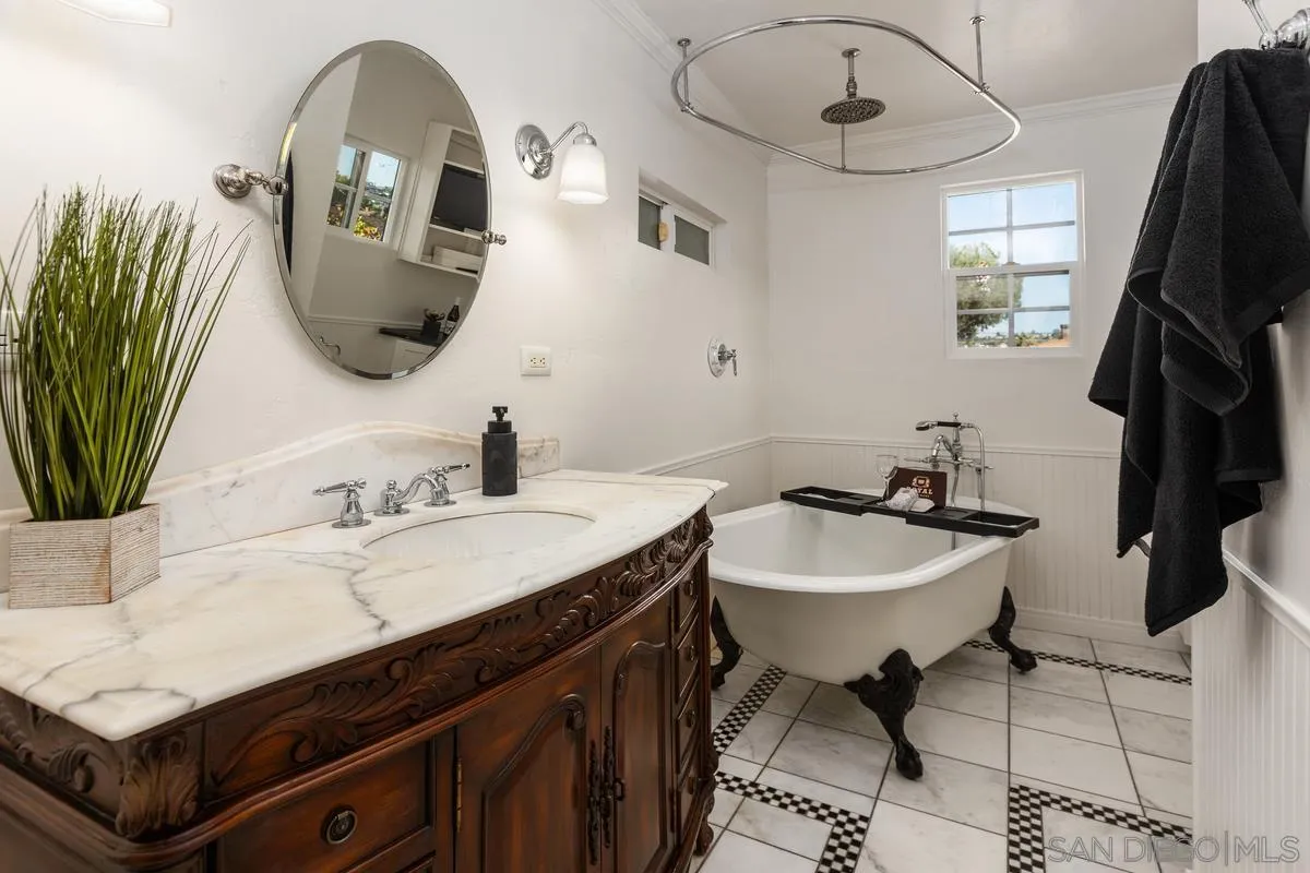 2707 Sweetwater Road Spring Valley, CA 91977 - Photo 11 of 30 a bathroom with a sink and a mirror