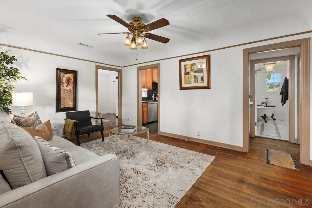2707 Sweetwater Road Spring Valley, CA 91977 - Photo 3 of 30 a living room with furniture and a wooden floor