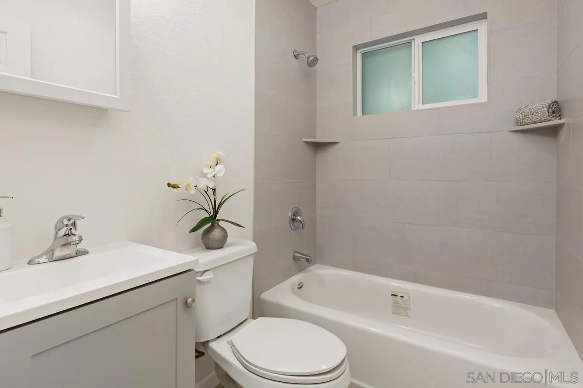 2707 Sweetwater Road Spring Valley, CA 91977 - Photo 8 of 30 a bathroom with a sink a toilet and shower