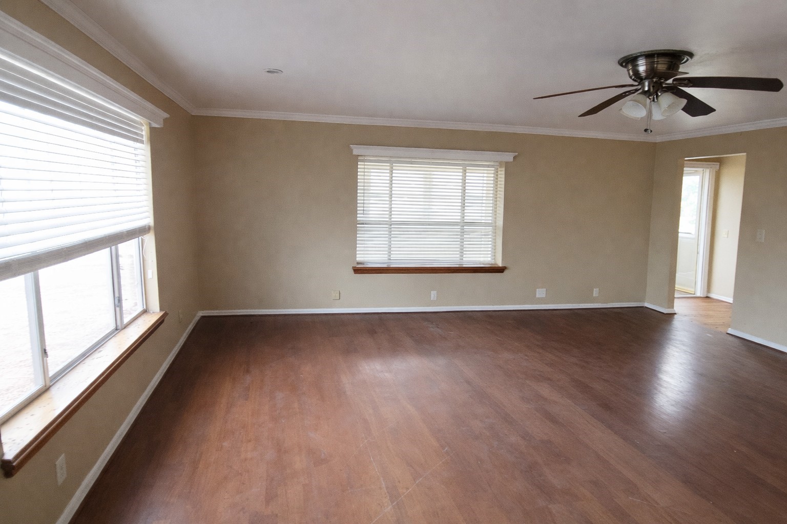 350 Robbie Lee Road Magnolia, TX 77354 - Photo 5 of 9 a view of an empty room with wooden floor and a window