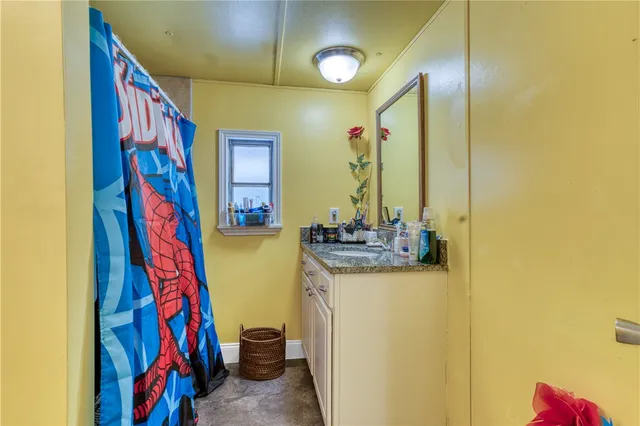 a view of a living room with a bathroom