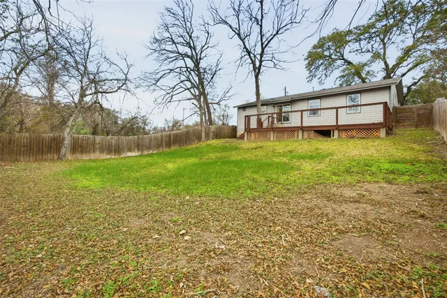 a view of a yard with a trees