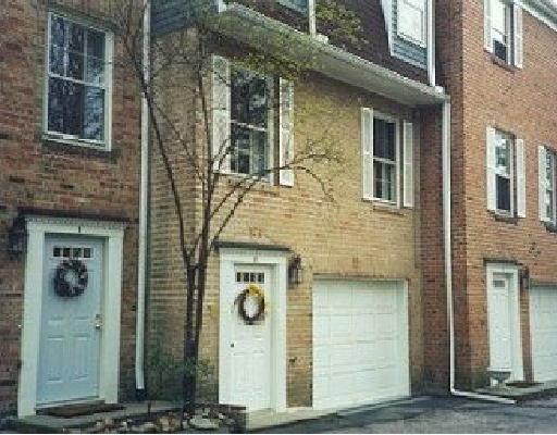 3 Valley View Road, Unit 8 Norwalk, CT 06851 - Photo 1 of 1 a front view of a house with a door