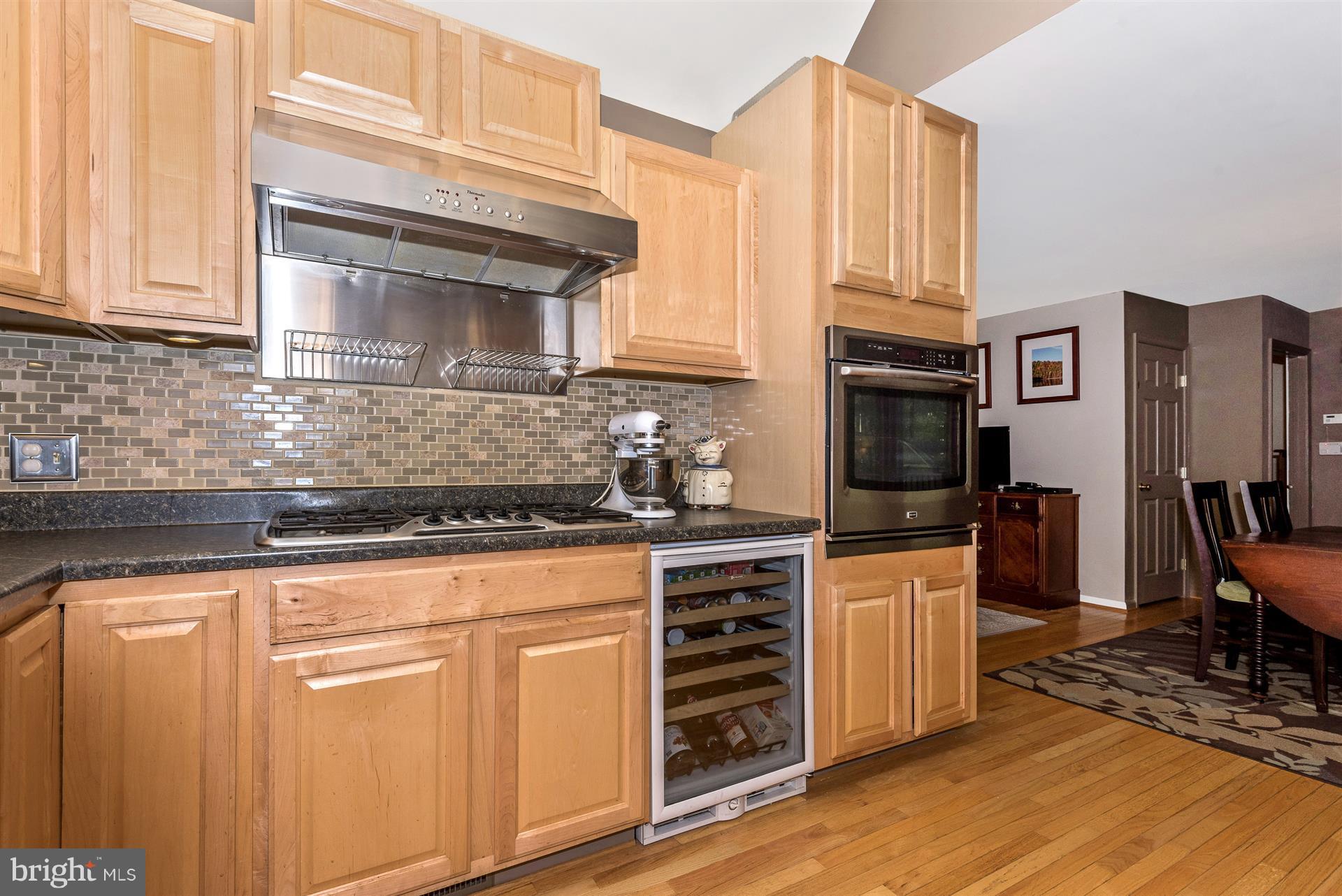 1722 Brookshire Run Point of Rocks, MD 21777 - Photo 18 of 30 a kitchen with stainless steel appliances granite countertop a stove a sink and a microwave