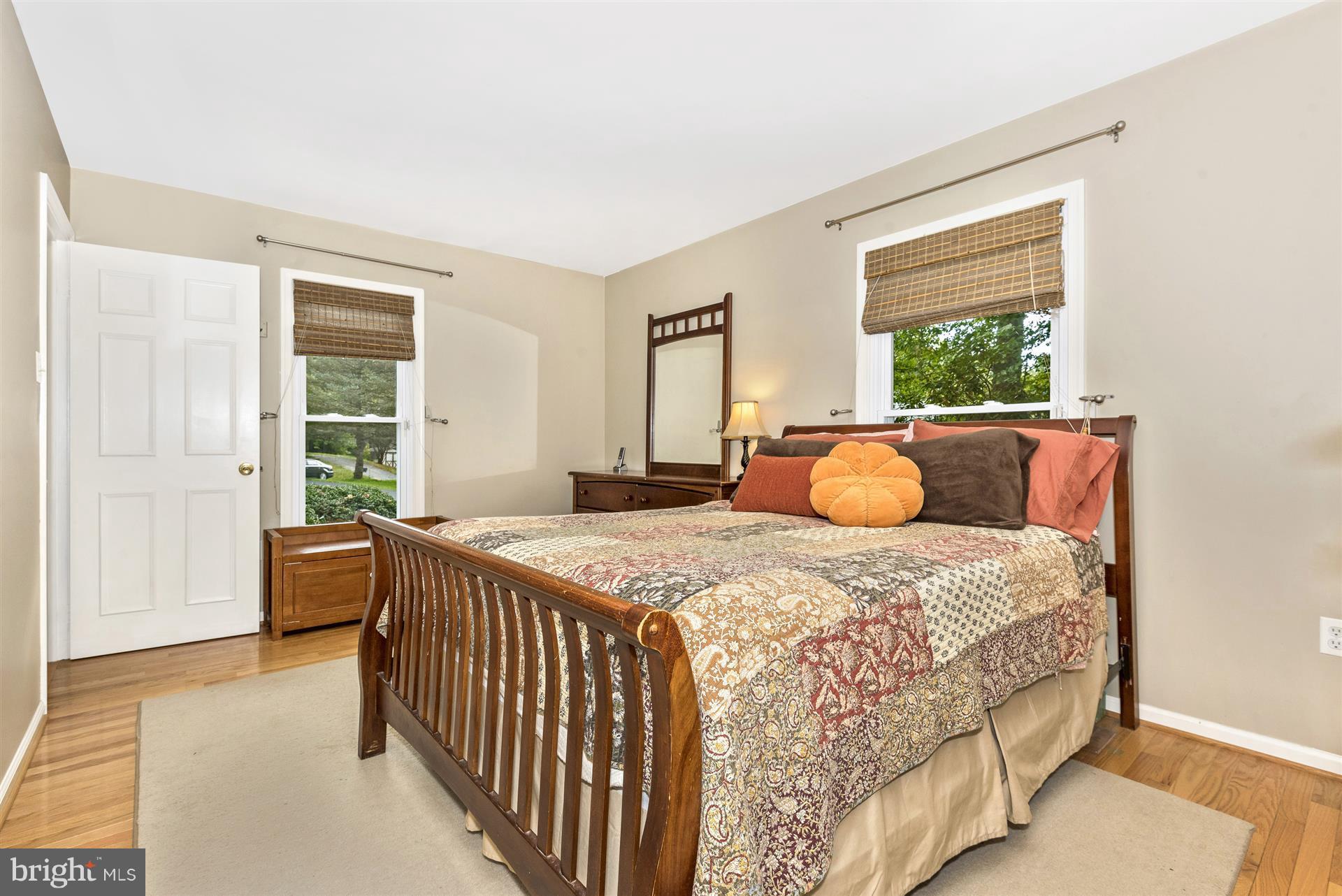 1722 Brookshire Run Point of Rocks, MD 21777 - Photo 21 of 30 a bedroom with a bed and wooden floor