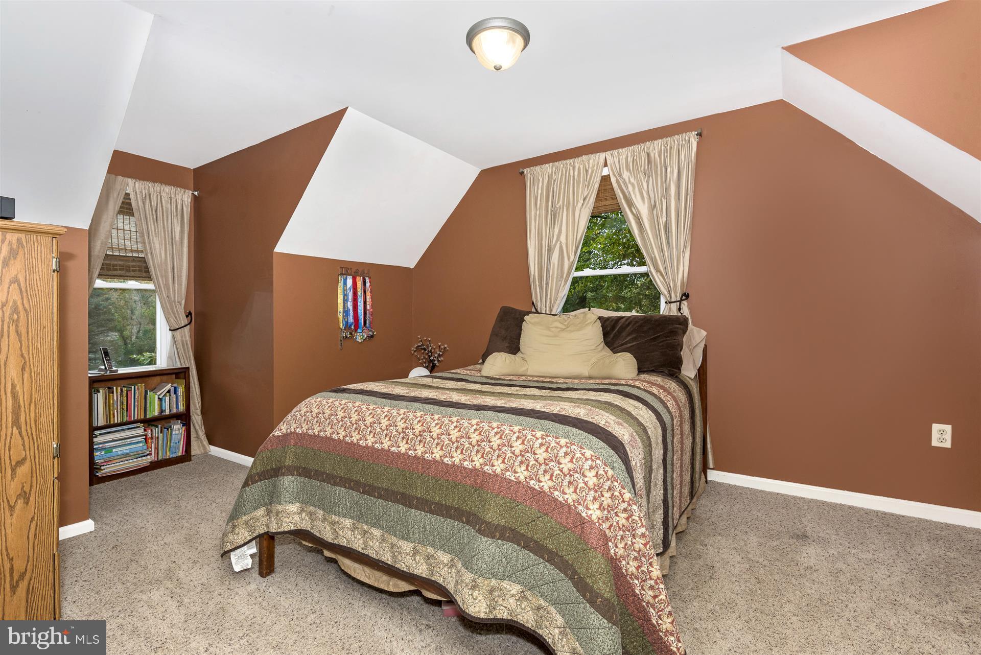 1722 Brookshire Run Point of Rocks, MD 21777 - Photo 26 of 30 a bedroom with a bed and a window