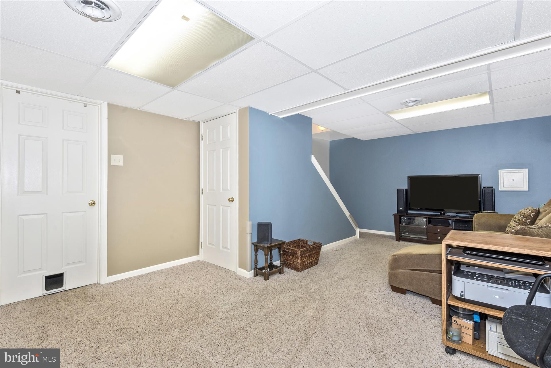 1722 Brookshire Run Point of Rocks, MD 21777 - Photo 28 of 30 a room with furniture and a flat screen tv
