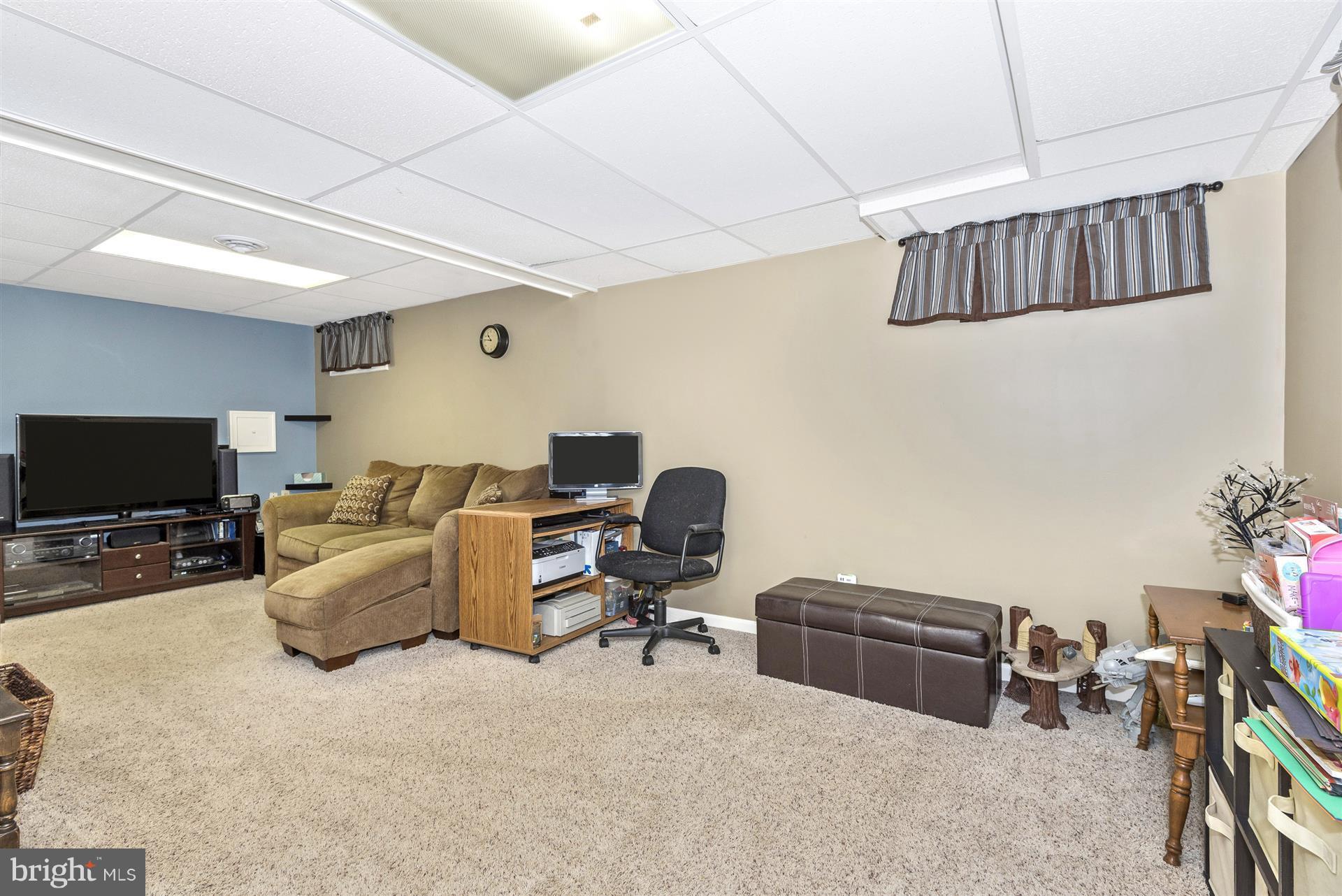 1722 Brookshire Run Point of Rocks, MD 21777 - Photo 30 of 30 a view of livingroom with workspace and a couch