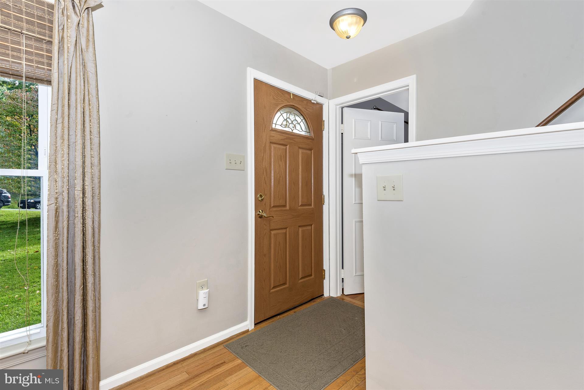1722 Brookshire Run Point of Rocks, MD 21777 - Photo 9 of 30 a view of an entryway with wooden floor and windows