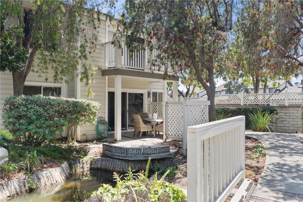 22232 South Vermont Avenue, Unit 102B Torrance, CA 90502 - Photo 1 of 26 a view of house with backyard outdoor seating and green space