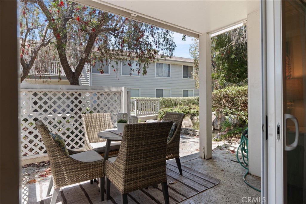 22232 South Vermont Avenue, Unit 102B Torrance, CA 90502 - Photo 21 of 26 a view of a chairs and table in the balcony