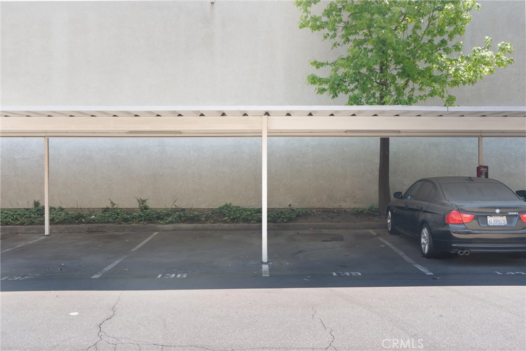 22232 South Vermont Avenue, Unit 102B Torrance, CA 90502 - Photo 24 of 26 a view of a car in a parking area