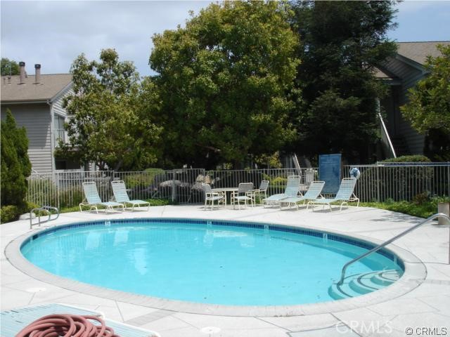 22232 South Vermont Avenue, Unit 102B Torrance, CA 90502 - Photo 25 of 26 a view of a swimming pool with a patio