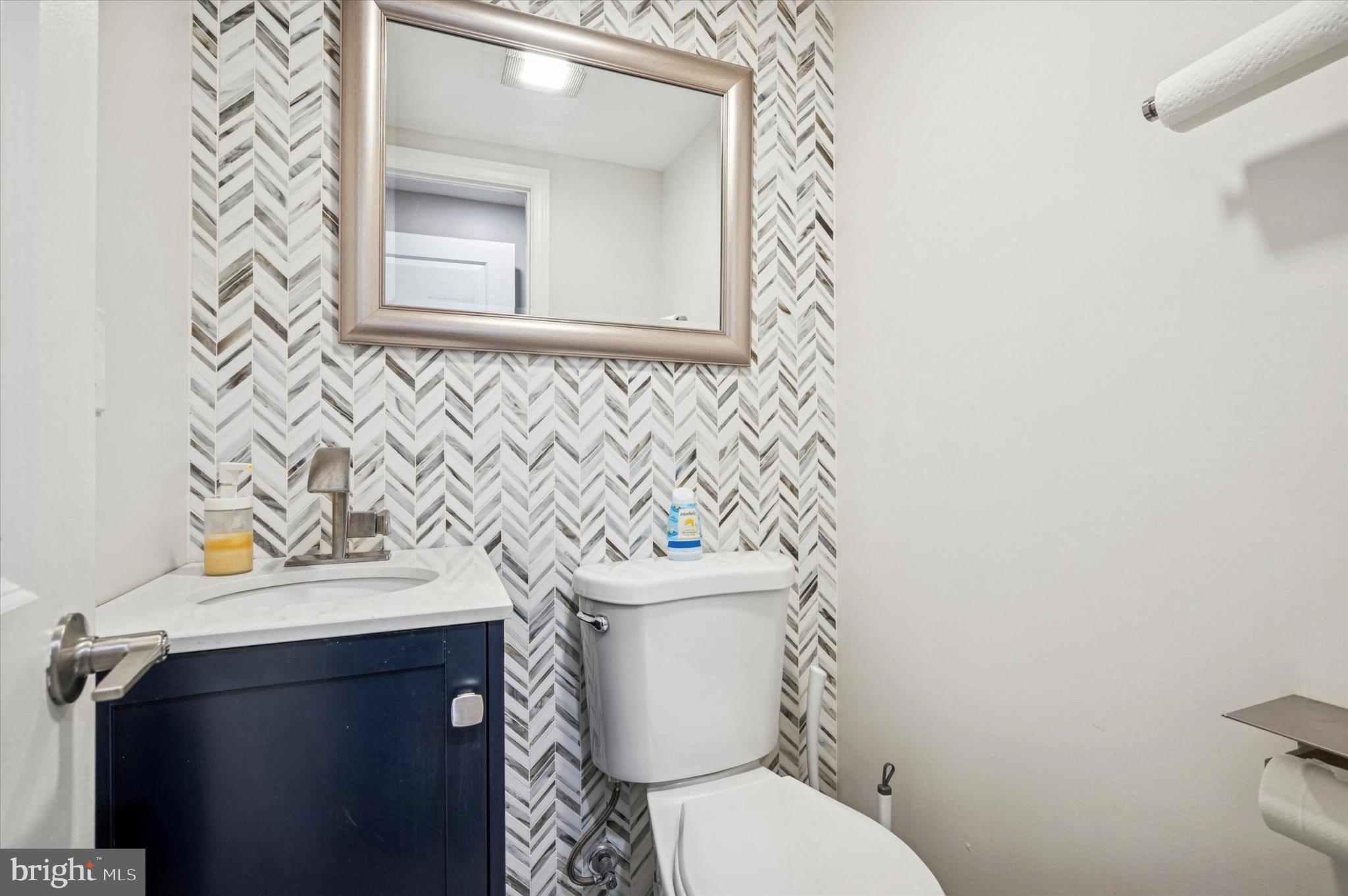 7410 Richards Road Elkins Park, PA 19027 - Photo 19 of 22 a white toilet sitting next to a bathroom sink