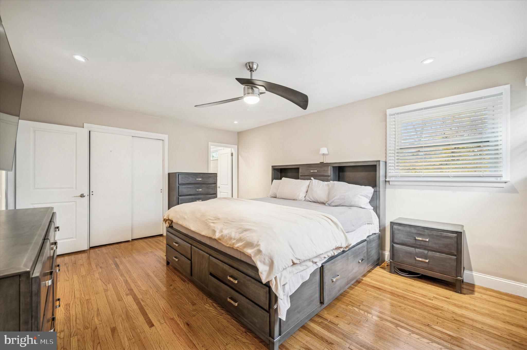 7410 Richards Road Elkins Park, PA 19027 - Photo 10 of 22 a large bedroom with a bed and wooden floor