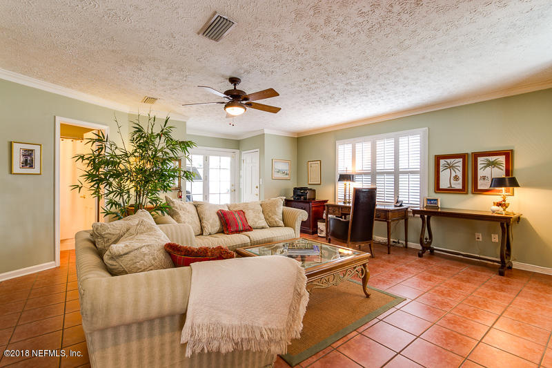 3679 Rustic Lane Jacksonville, FL 32217 - Photo 17 of 42 a living room with furniture flowerpot and window