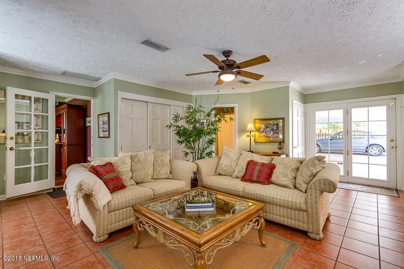 3679 Rustic Lane Jacksonville, FL 32217 - Photo 18 of 42 a living room with furniture and a large window