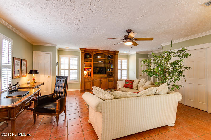 3679 Rustic Lane Jacksonville, FL 32217 - Photo 19 of 42 a living room with furniture and wooden floor