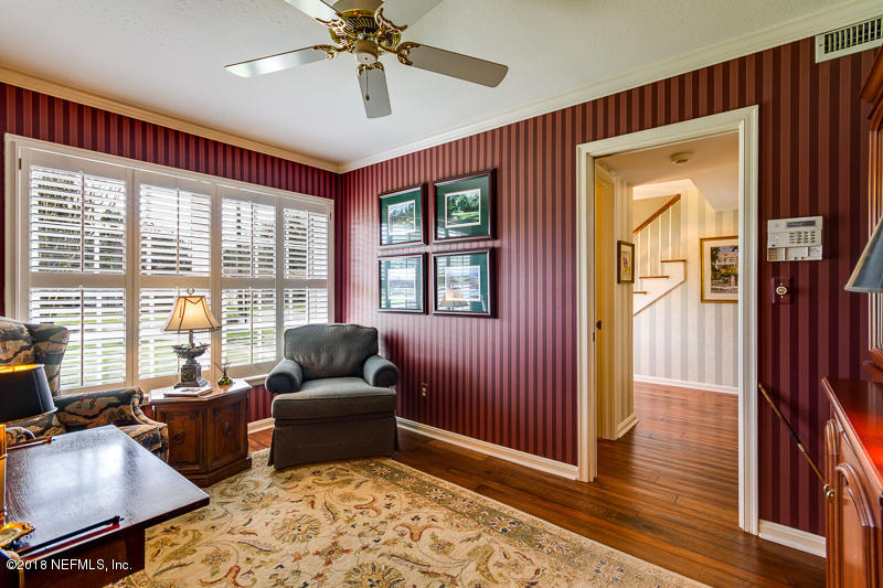 3679 Rustic Lane Jacksonville, FL 32217 - Photo 20 of 42 a living room with furniture and a window