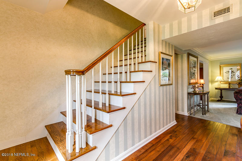 3679 Rustic Lane Jacksonville, FL 32217 - Photo 3 of 42 a view of entryway and hall with wooden floor
