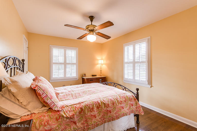 3679 Rustic Lane Jacksonville, FL 32217 - Photo 31 of 42 a bedroom with a bed and a window