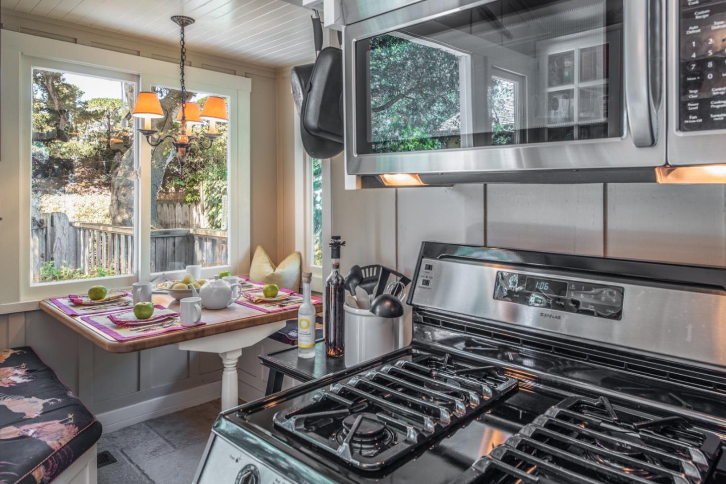 2- Carpenter & 3rd Street Carmel, CA 93921 - Photo 11 of 22 a kitchen with a stove a sink and cabinets