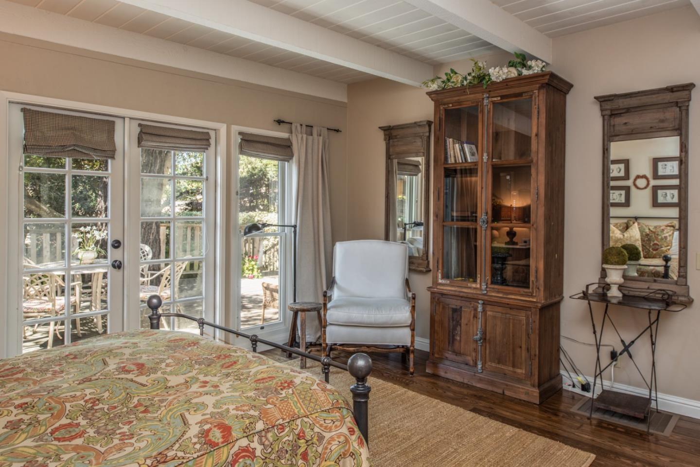 2- Carpenter & 3rd Street Carmel, CA 93921 - Photo 15 of 22 a bedroom with furniture and a window