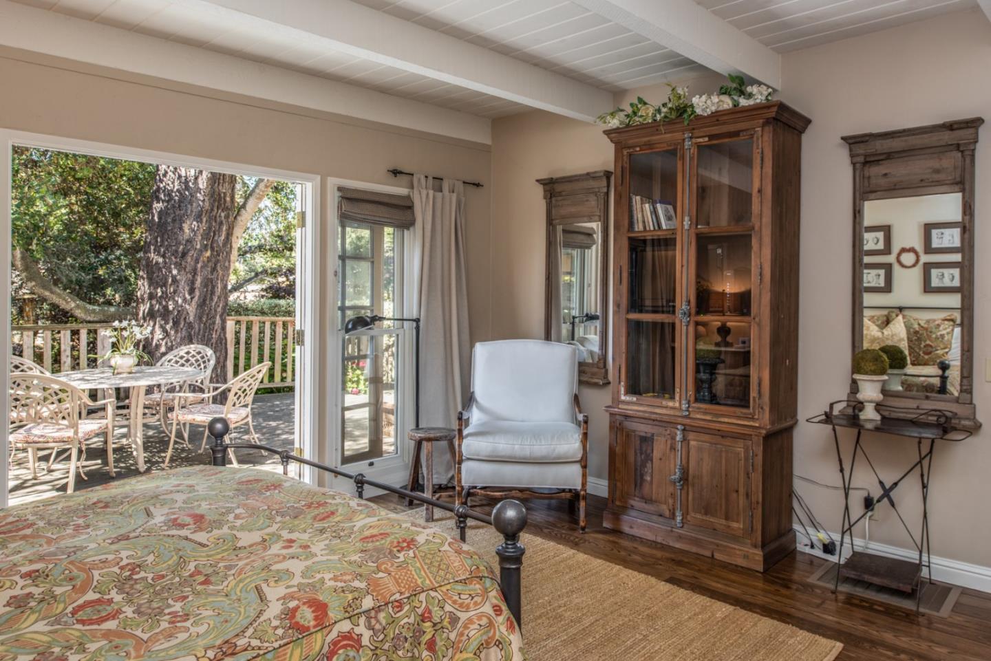 2- Carpenter & 3rd Street Carmel, CA 93921 - Photo 16 of 22 a bedroom with furniture and large windows