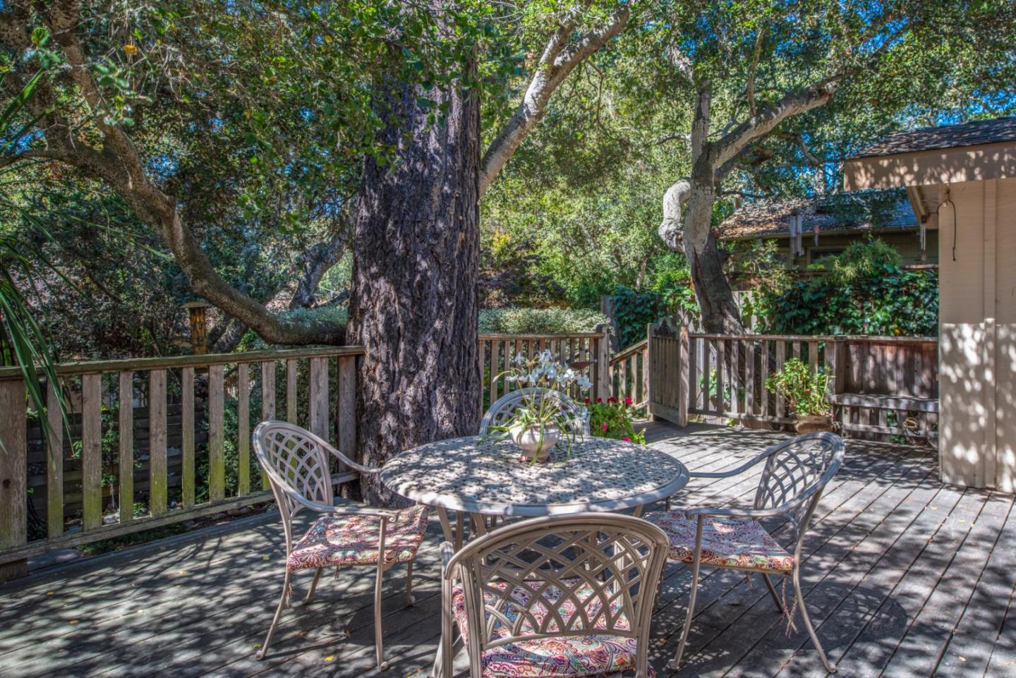 2- Carpenter & 3rd Street Carmel, CA 93921 - Photo 20 of 22 a view of a chairs and table in the backyard