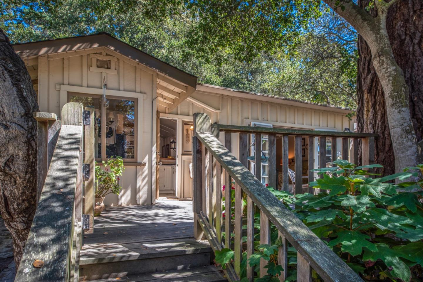 2- Carpenter & 3rd Street Carmel, CA 93921 - Photo 22 of 22 a view of a house with brick walls and potted plants