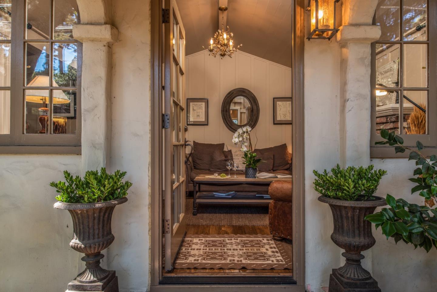 2- Carpenter & 3rd Street Carmel, CA 93921 - Photo 3 of 22 a living room with furniture and a potted plant