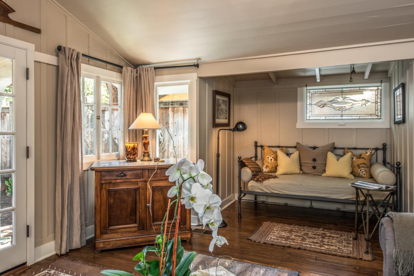 2- Carpenter & 3rd Street Carmel, CA 93921 - Photo 6 of 22 a living room with furniture a rug and white walls