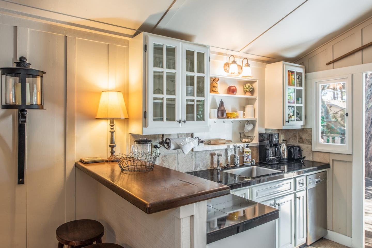 2- Carpenter & 3rd Street Carmel, CA 93921 - Photo 9 of 22 a kitchen with a sink and a refrigerator
