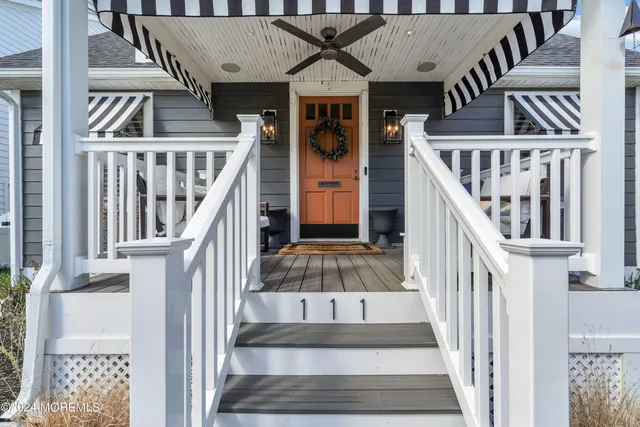 a bedroom with a bed and a television
