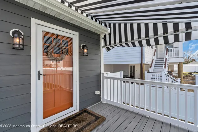a spacious bedroom with a bed and a window